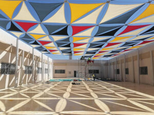 Geometric tensile membrane shade structure in school outdoor area dubai