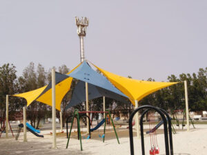 Triangular tensile shade structure for playground area in UAE